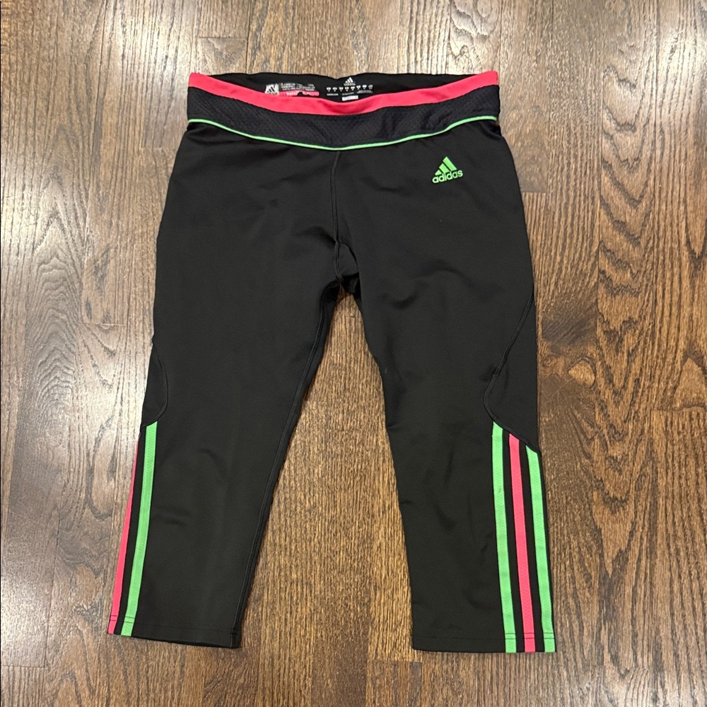 Adidas woman’s medium Black Leggings with Green and Pink Stripes